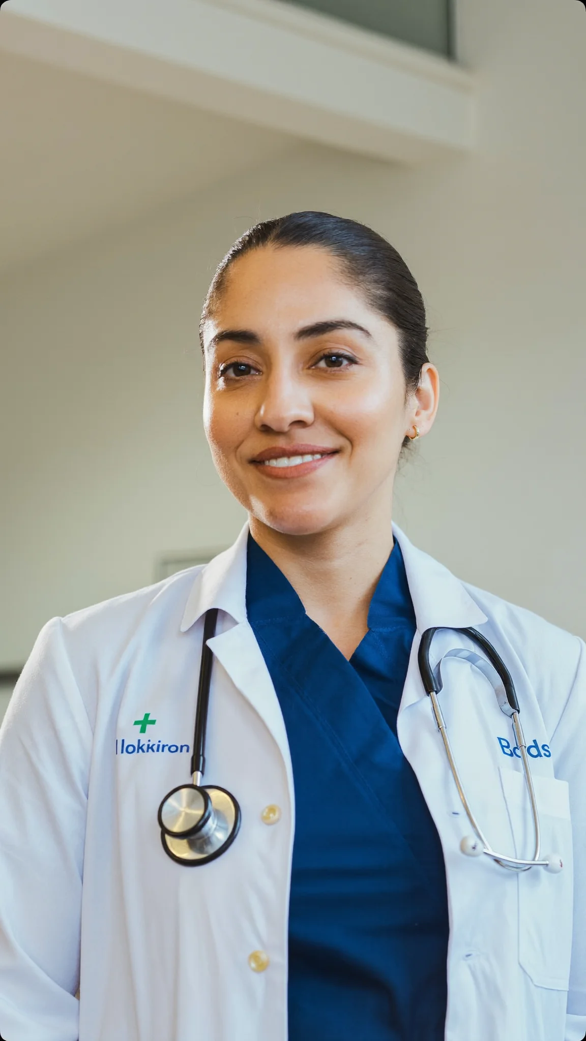 Female doctor speaking to camera in an AI clone video for a clinic